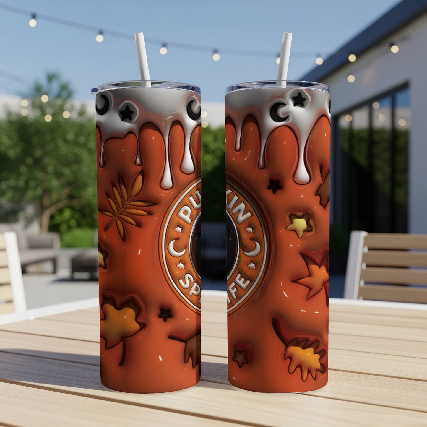 Orange tumbler with "Pumpkin Spice Cafe" text and autumn leaf motifs.