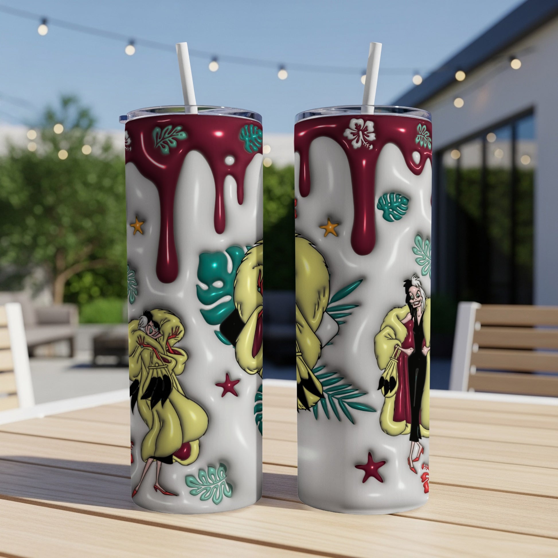 Two tumblers with Cruella de Vil and tropical motifs.