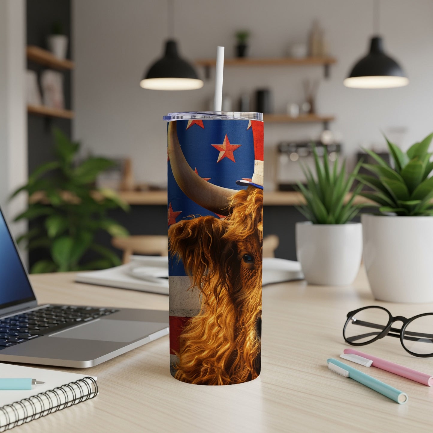 Highland cow wearing a cowboy hat and American flag background on a tumbler.