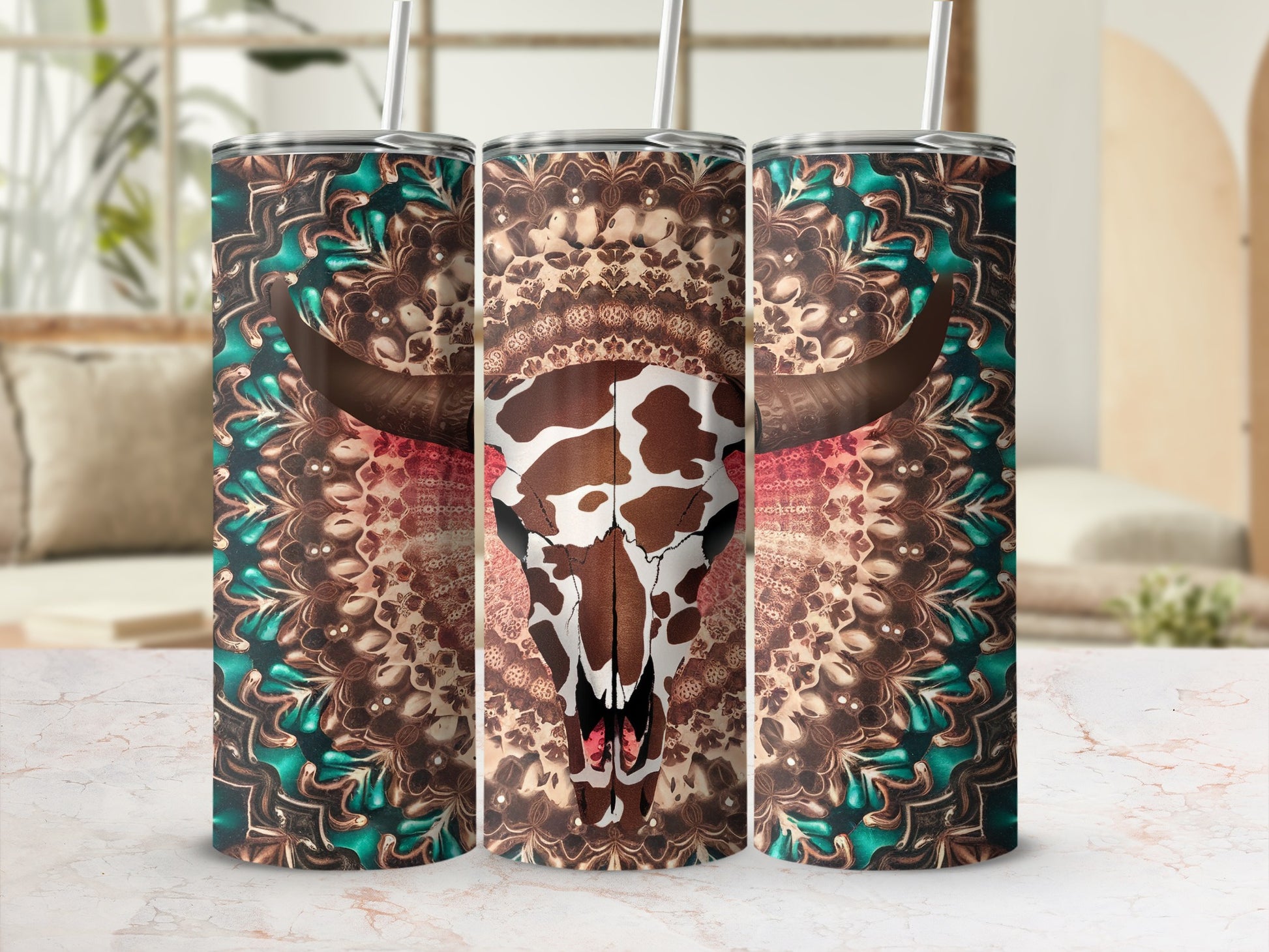 Cow skull with mandala pattern on cylindrical tumblers.