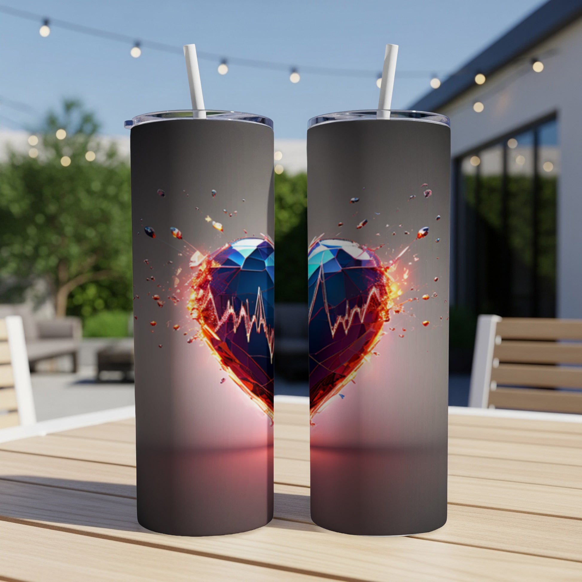 Two tumblers with a faceted heart design featuring a heartbeat line.
