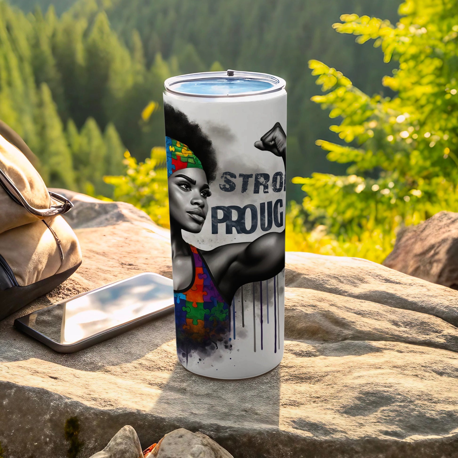 Woman with puzzle piece headband flexing arm, "Strong" text on tumbler.