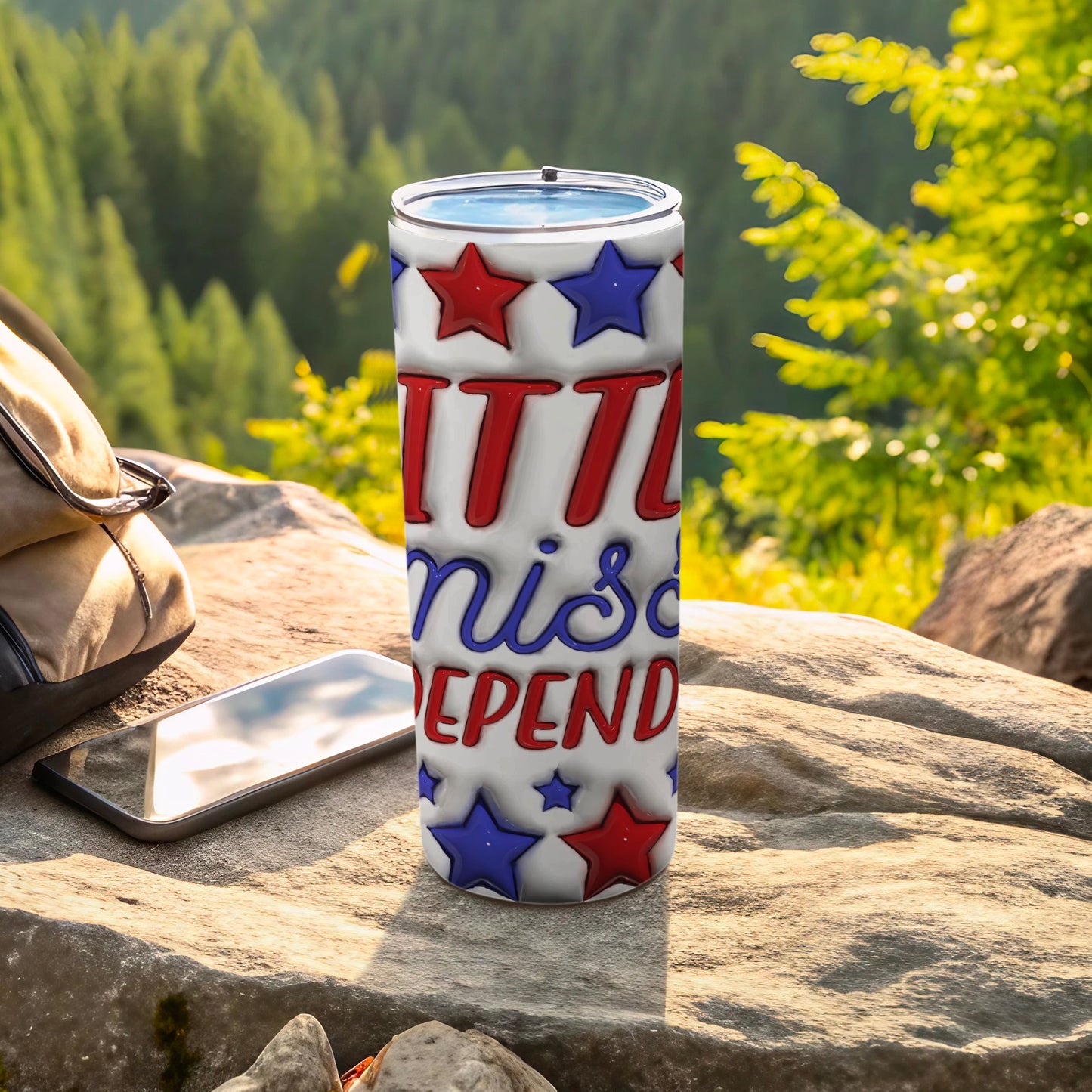 Red and blue stars adorn a tumbler with "Little Miss Independence" text.