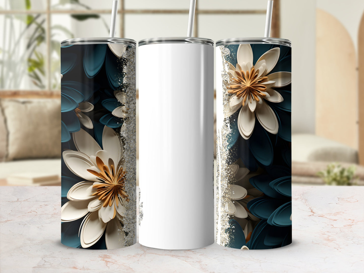 Three tumblers with white centers and floral designs on a marble surface.
