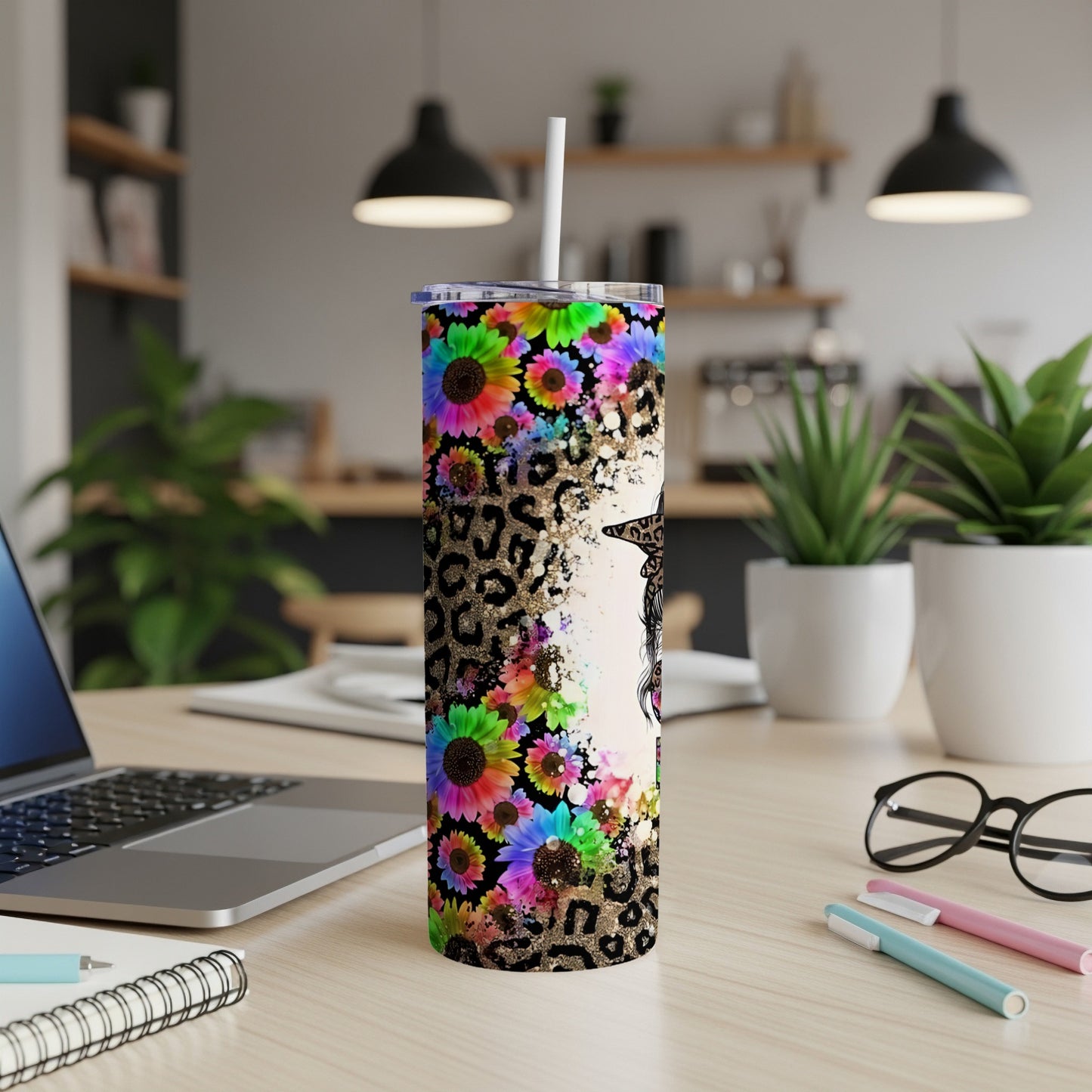 Tall floral and leopard print tumbler with a black cat silhouette.