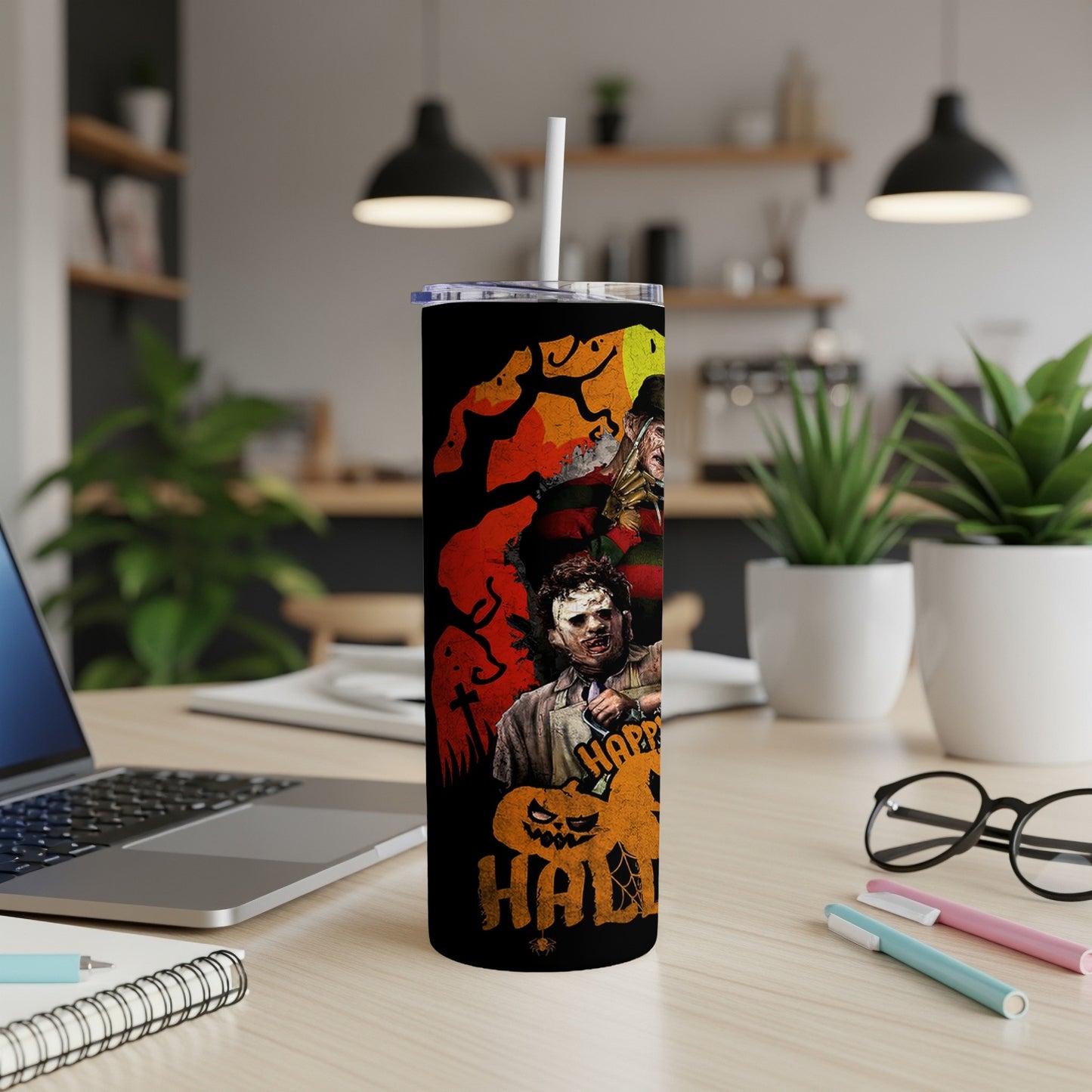 Halloween tumbler with horror movie villains and "Happy Halloween" text.