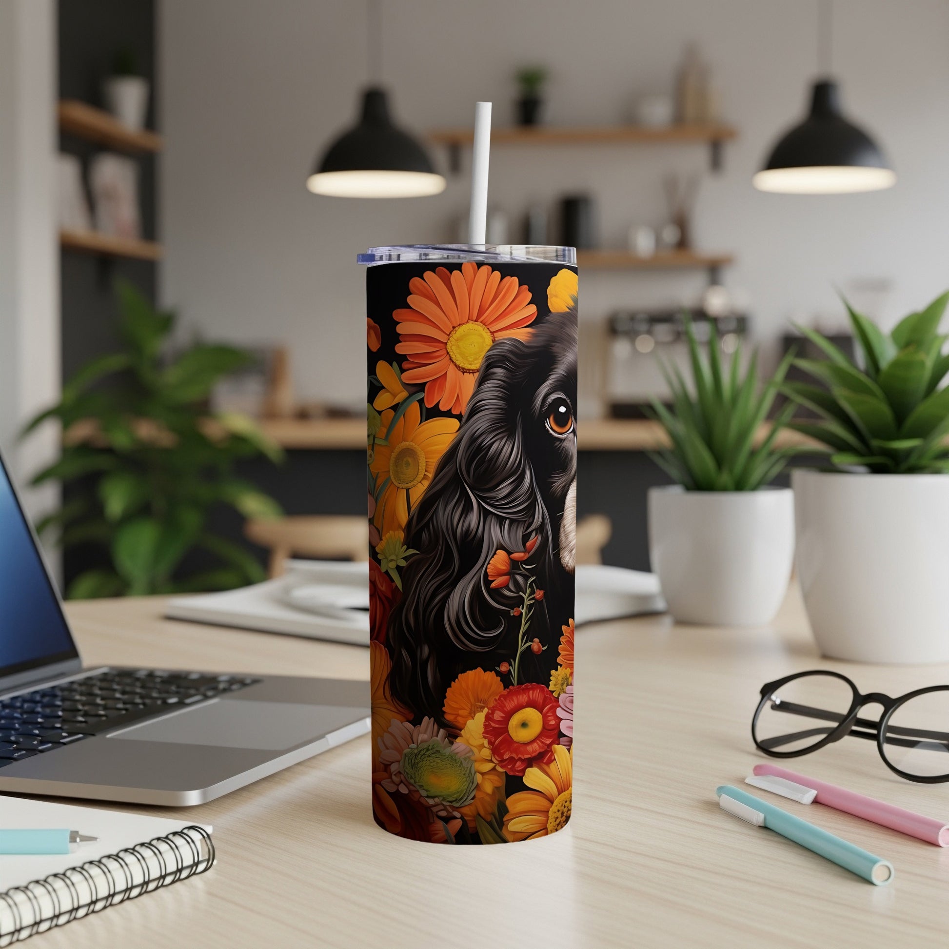 Black dog face with floral pattern on a dark background tumbler.