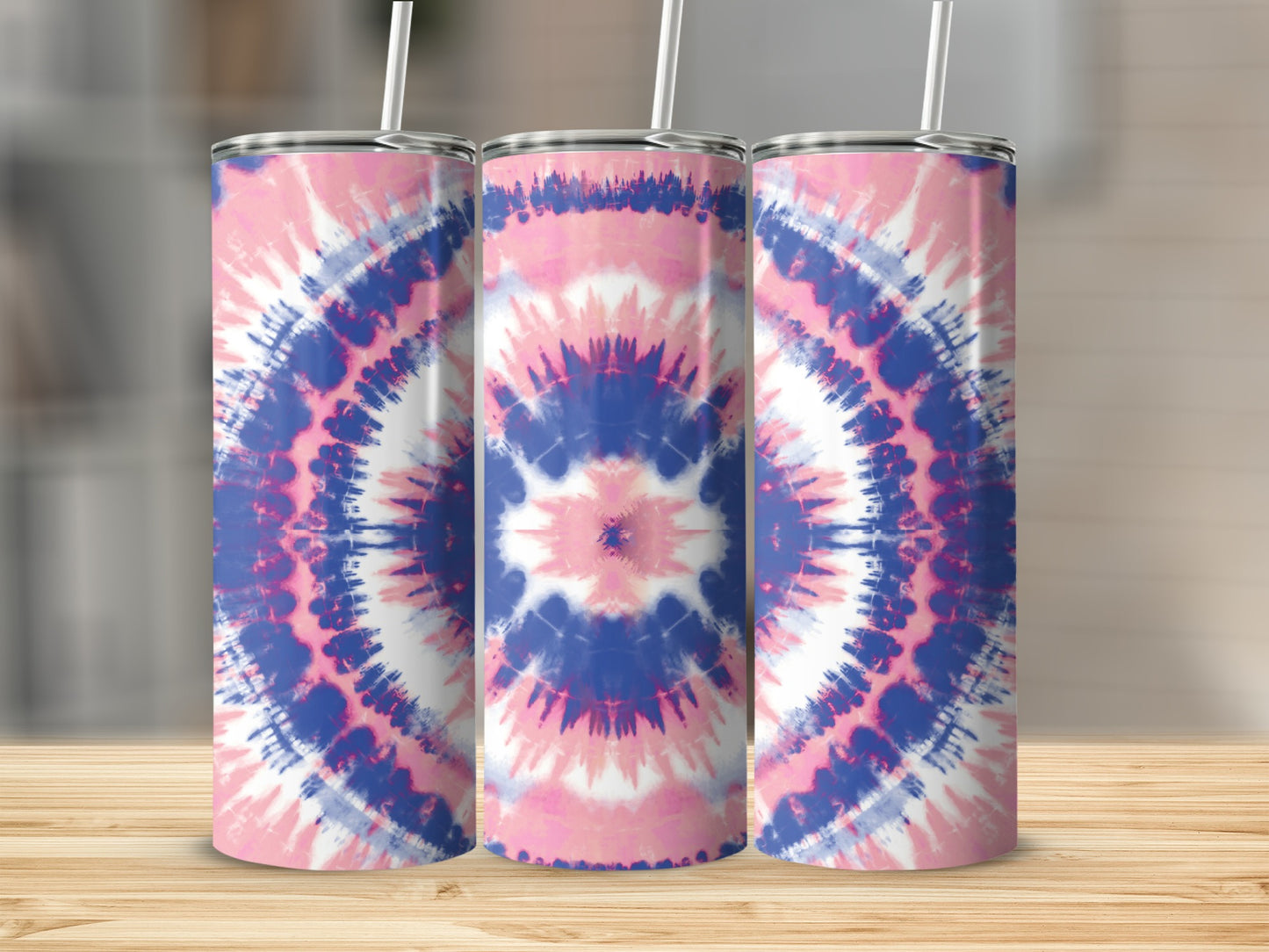 Three tumblers with a pink, blue, and white tie-dye design.