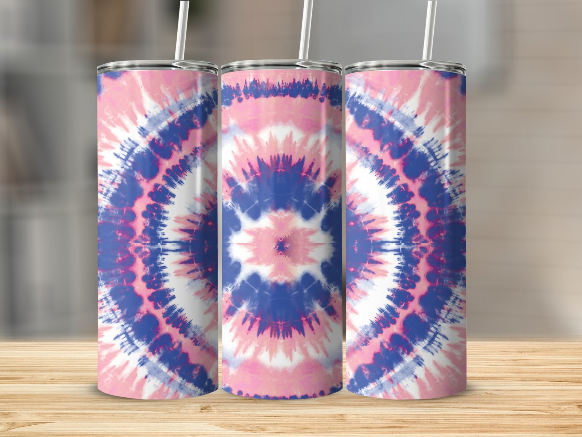 Three tumblers with a pink, blue, and white tie-dye design.