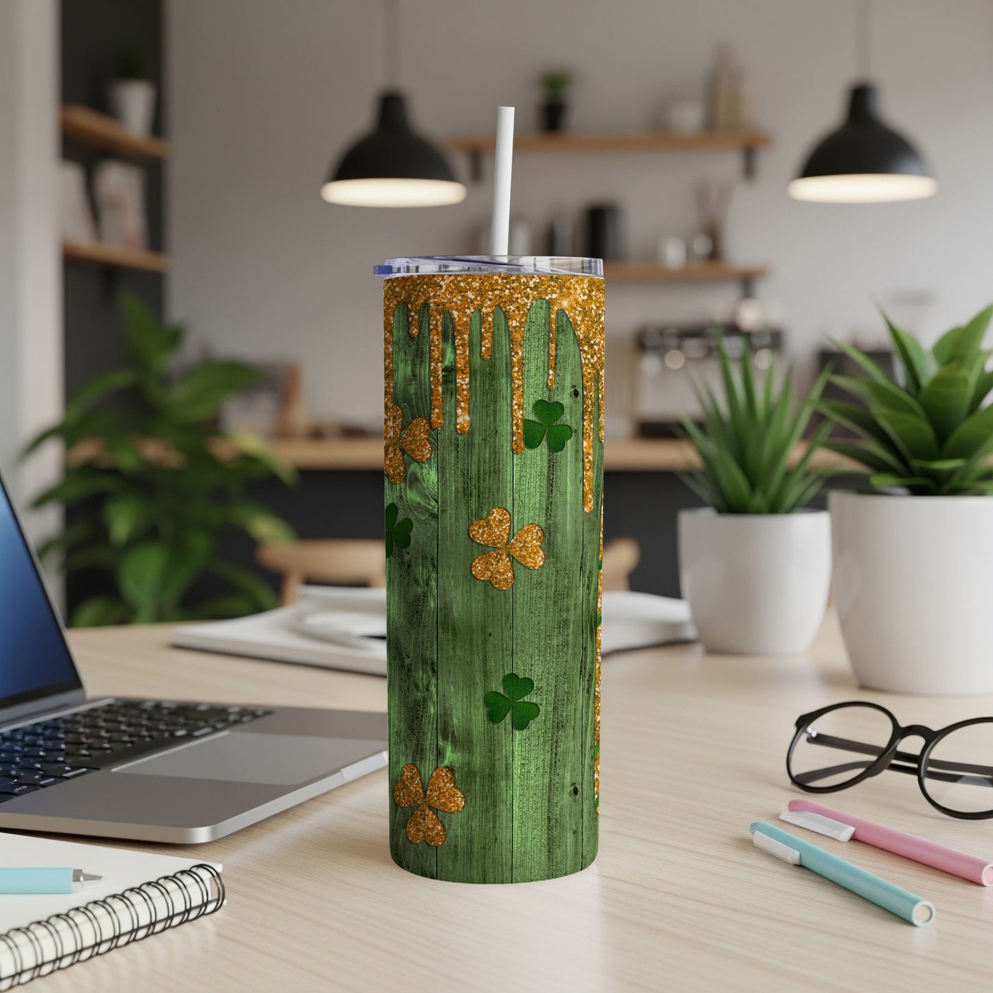 Green wood tumbler with gold glitter drips and shamrocks.