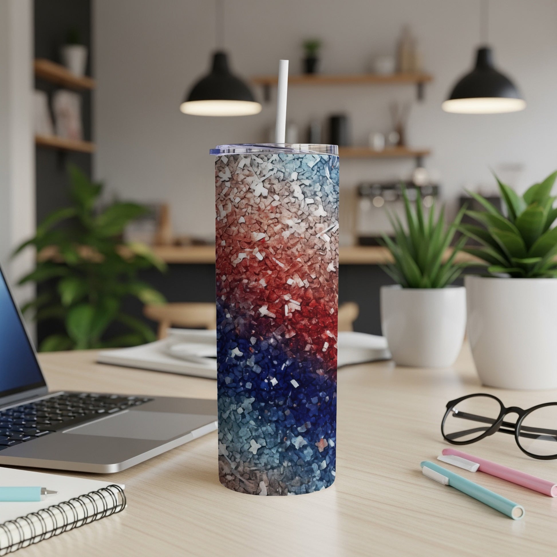 Glittery red, white, and blue patriotic design on a stainless steel tumbler.