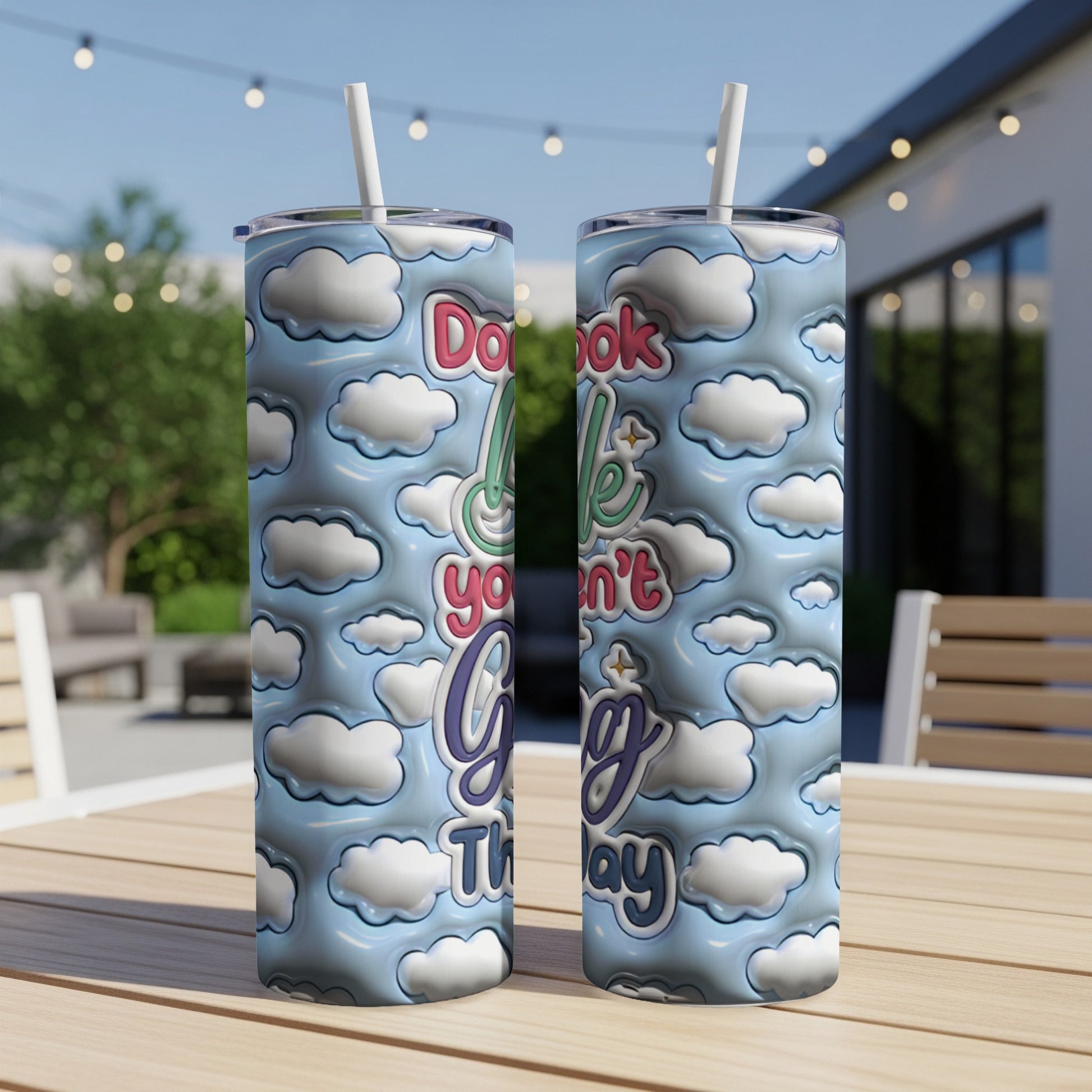 Two skinny tumblers with clouds and text "Don't Look Up. Life is Going To Try You."