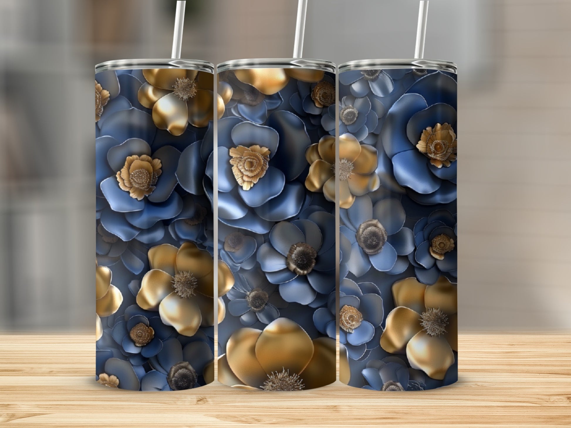 Three tumblers with a navy blue and gold floral pattern.