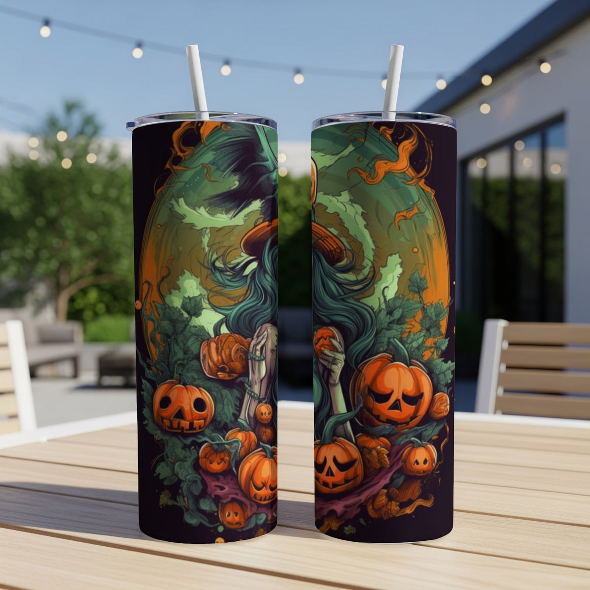 Halloween tumbler with witch, pumpkins, and spooky foliage design