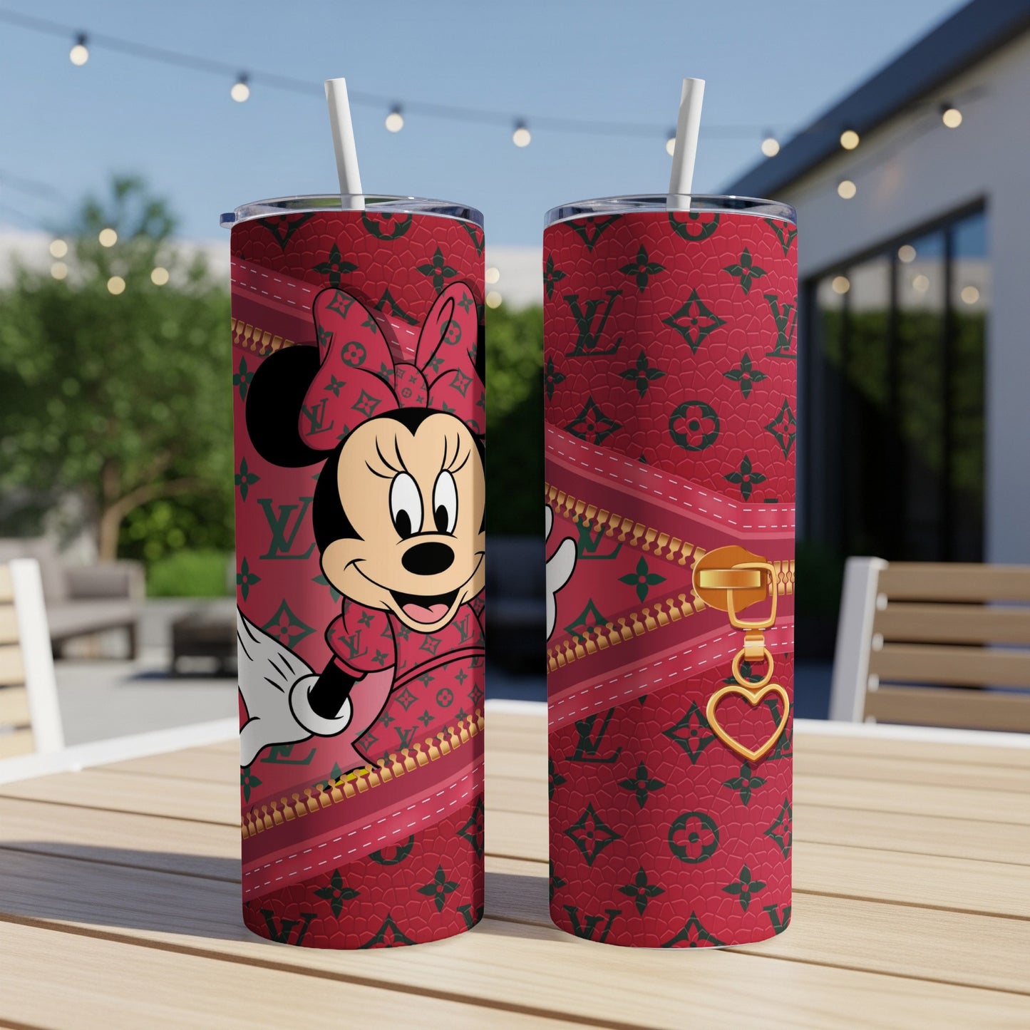 Minnie Mouse in red designer pattern tumbler with gold zipper detail.