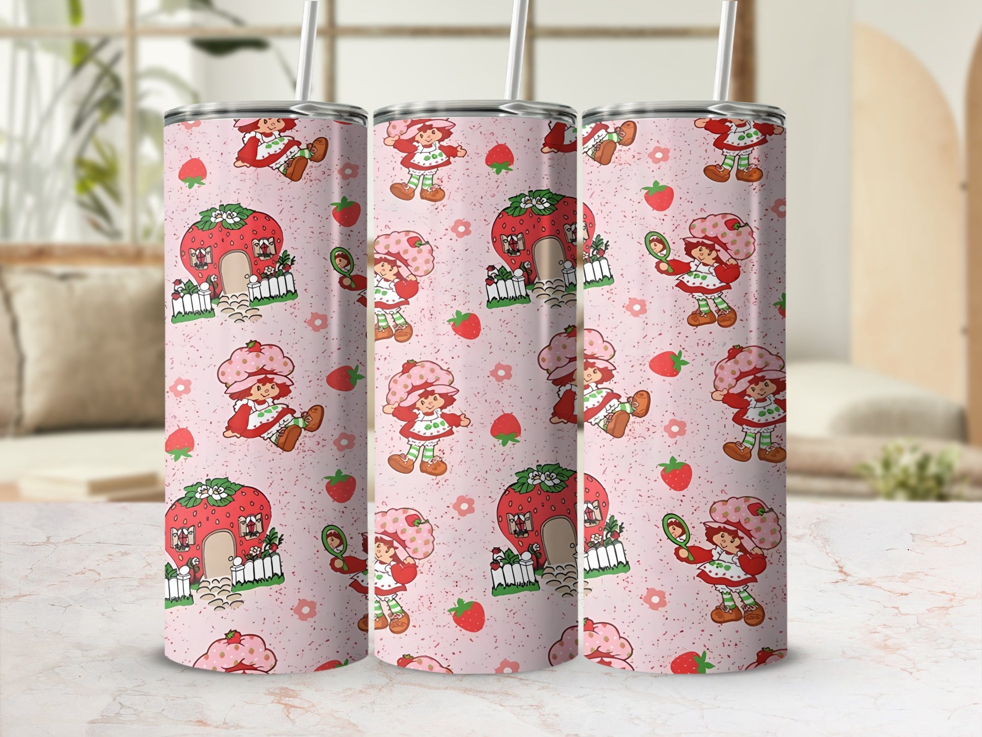 Pink tumbler with repeating Strawberry Shortcake pattern.