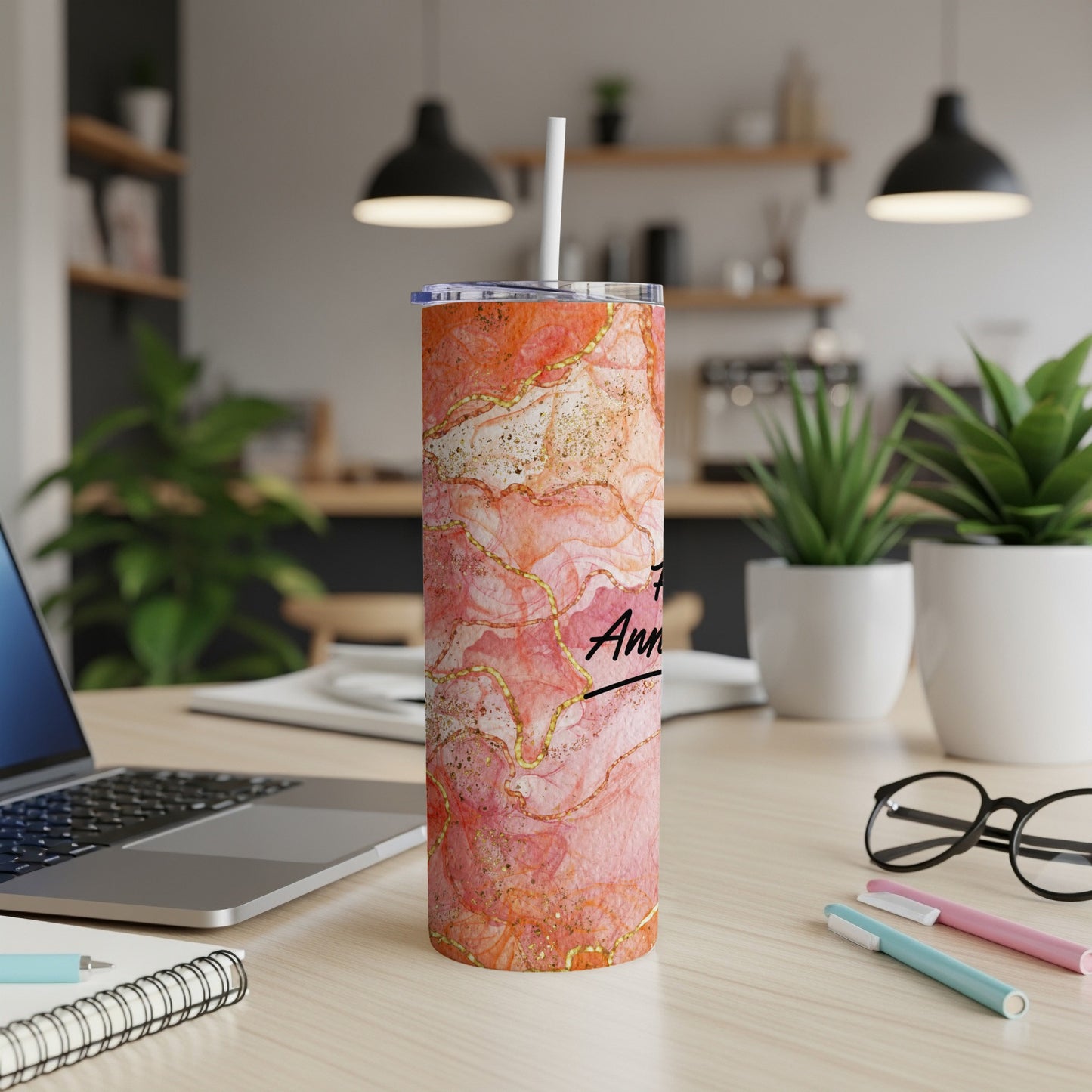 Marble patterned tumbler with "Anniversary" text and straw.