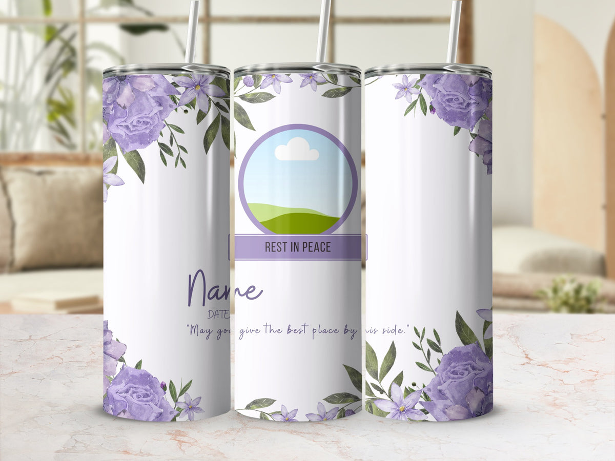 White tumbler with purple flowers and text, "Rest in Peace".