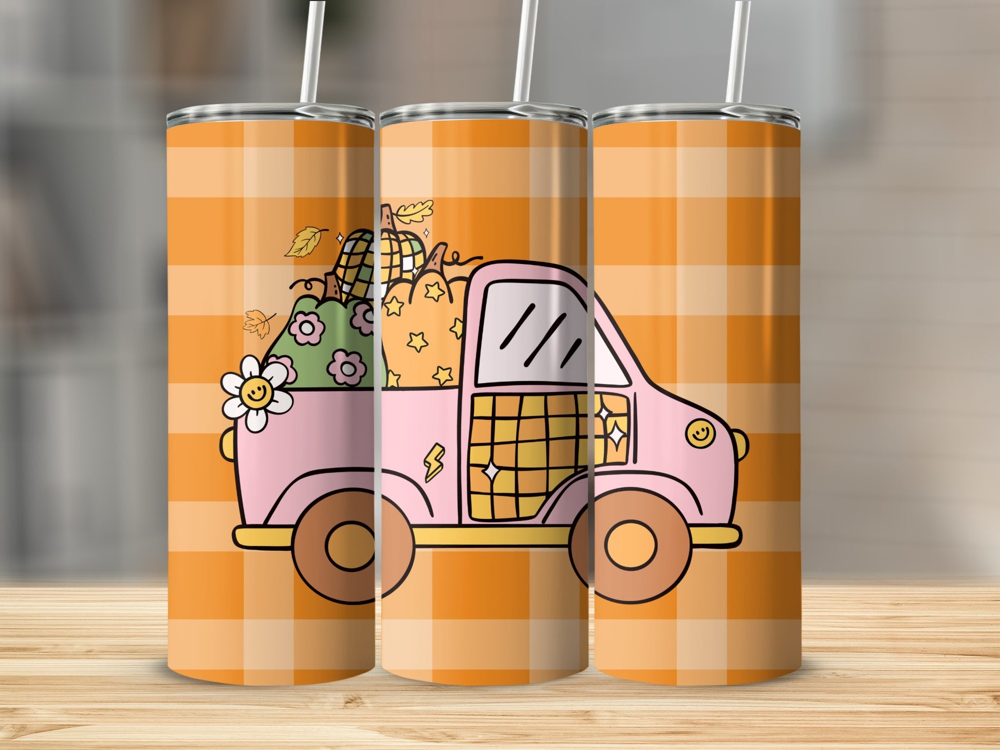 Pink truck with pumpkins and flowers on orange plaid background.