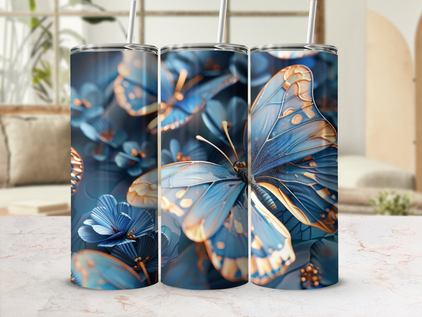 Blue and gold butterflies and flowers decorate a tall, slender tumbler.
