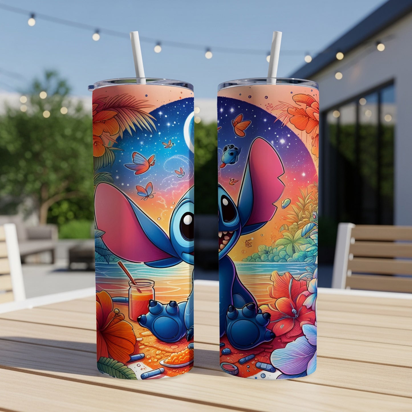Two Stitch tumblers with colorful tropical and starry backgrounds.