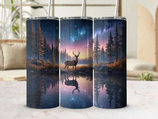 Tumbler with deer in forest reflected in water under starry sky.