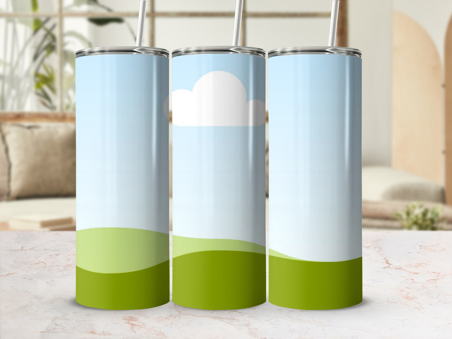 Three tumblers with a green rolling hills and blue sky design.
