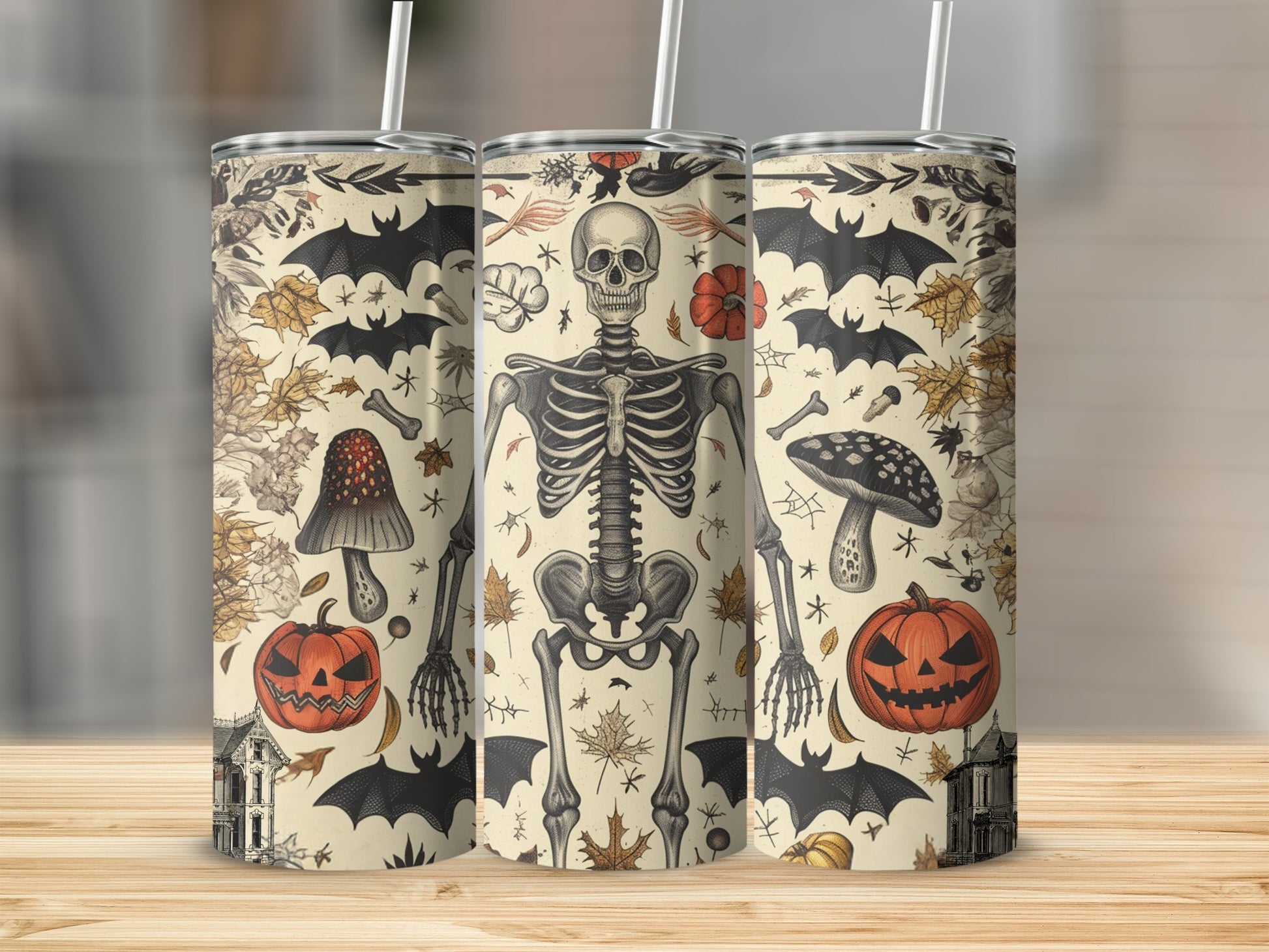 Halloween themed tumbler with skeleton, bats, pumpkins, mushrooms, and houses.