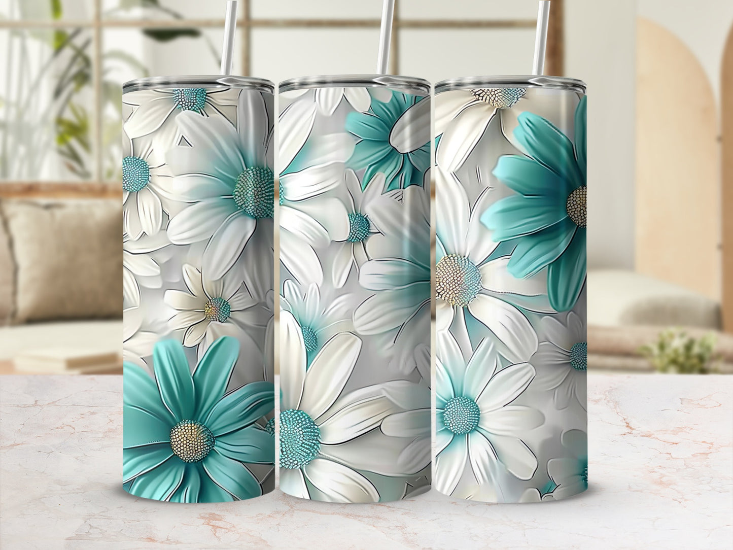 Three tumblers with white and teal daisy floral pattern.