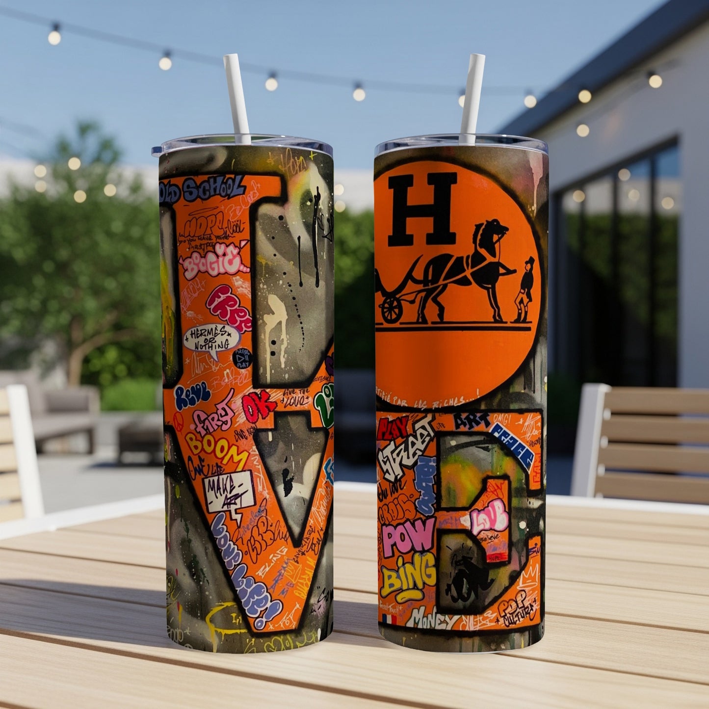 Two tumblers with graffiti art designs, one featuring the Hermes logo.