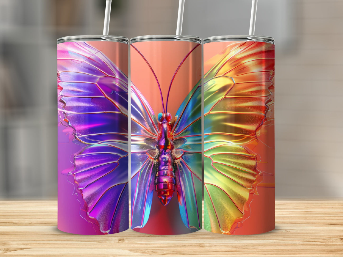 Three tumblers featuring a colorful iridescent butterfly design.