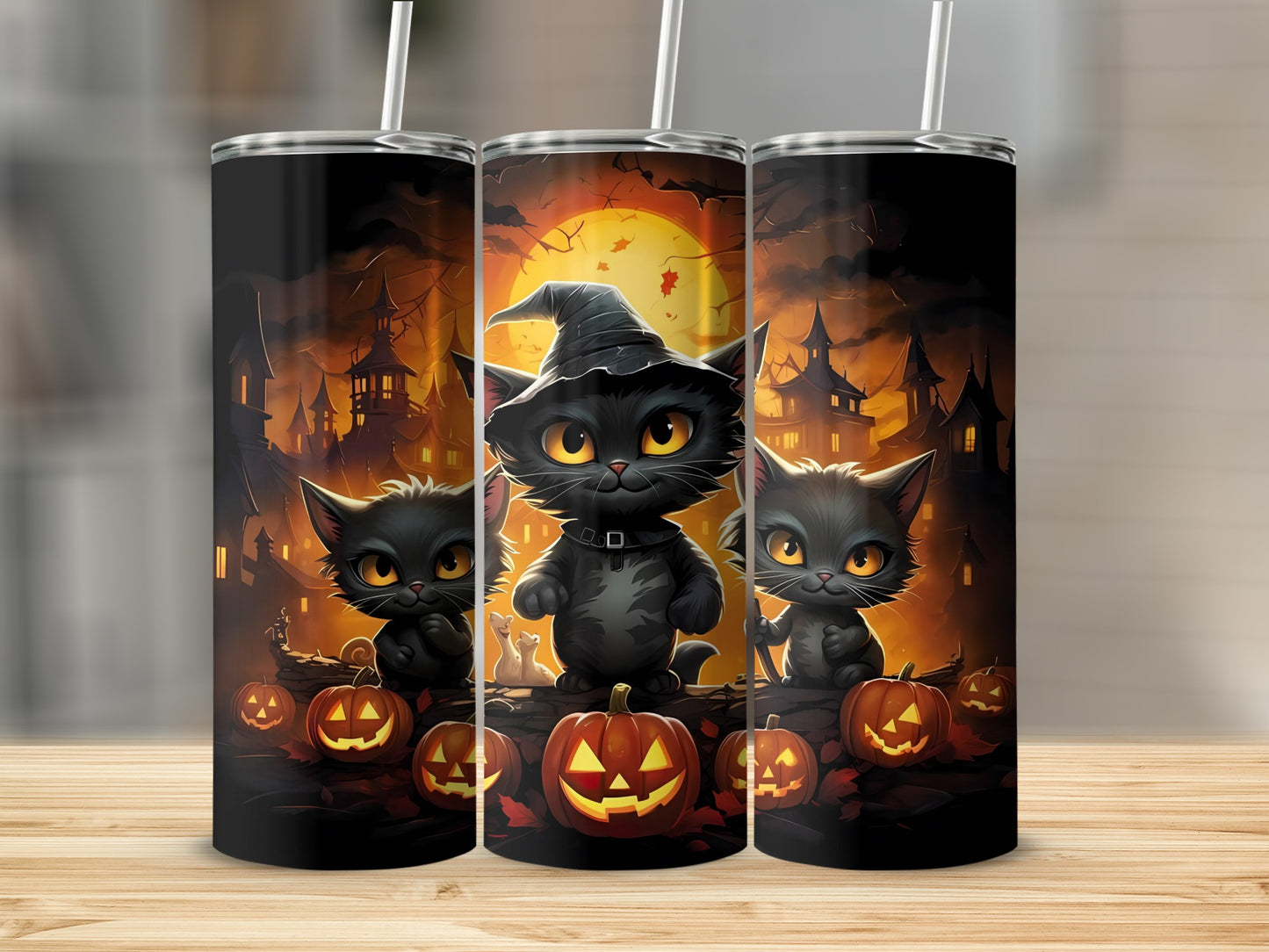 Three Halloween tumblers with cartoon black cats, pumpkins, and spooky castles.