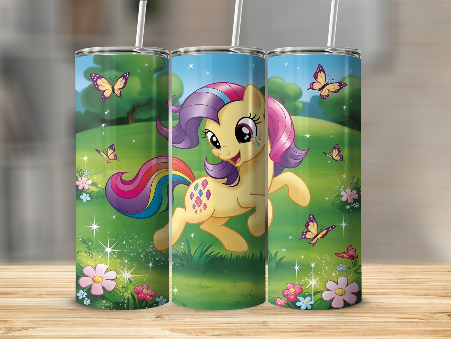 Yellow cartoon pony with rainbow mane and tail, surrounded by butterflies and flowers.
