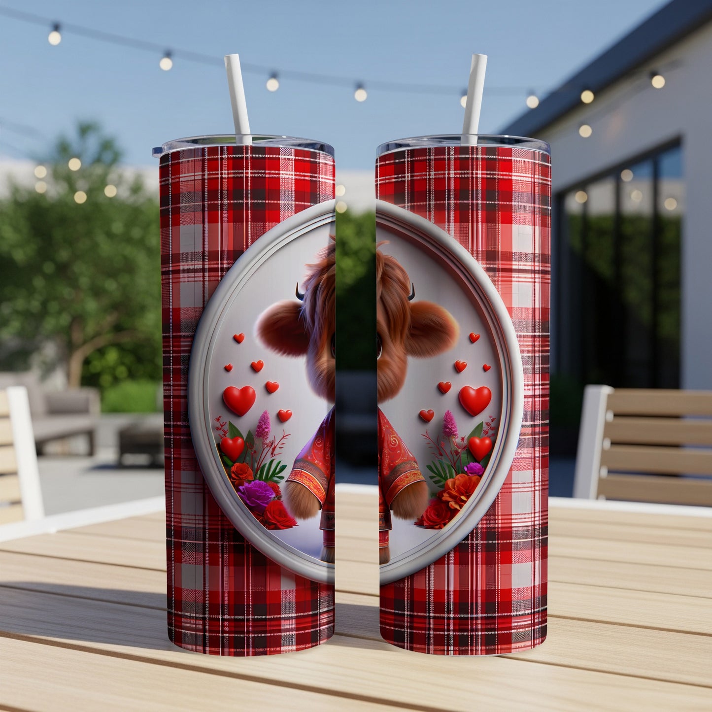 Tartan plaid tumbler with cartoon cow, hearts, and flowers.