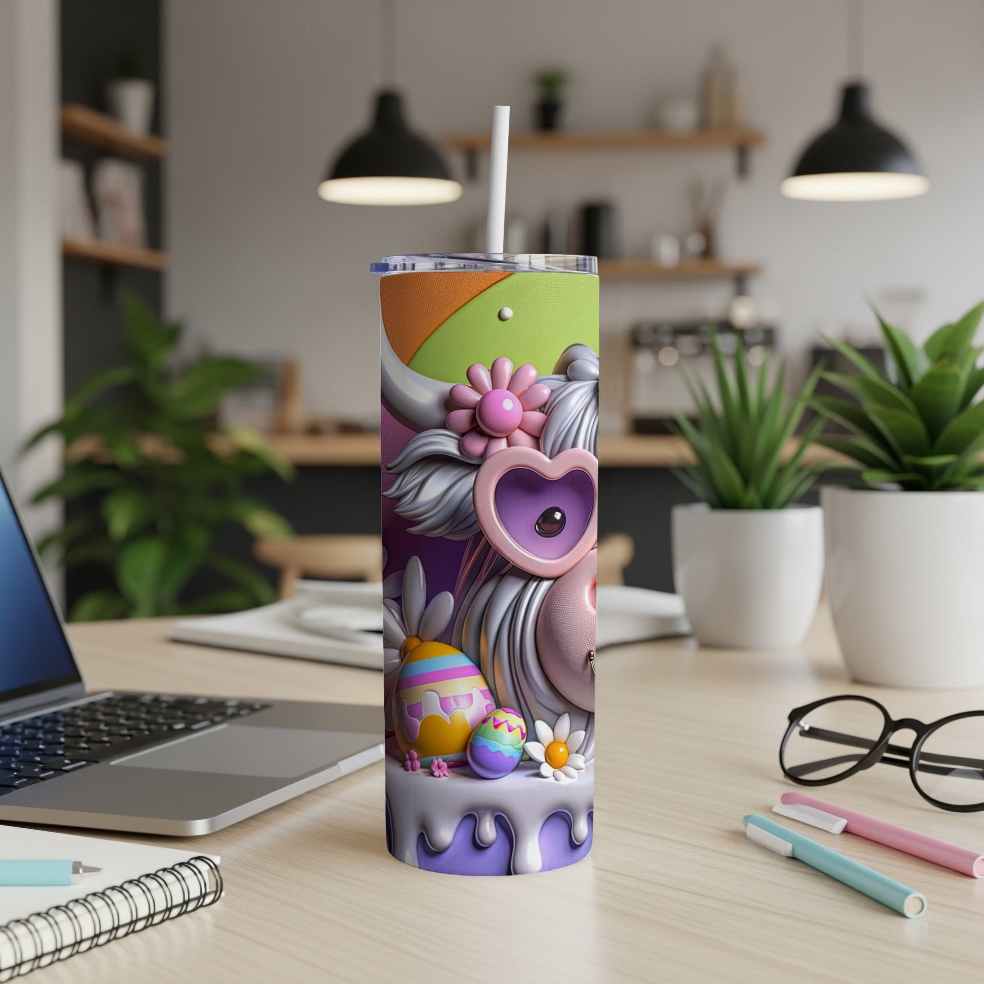 Easter egg tumbler with colorful abstract design and pastel flowers.