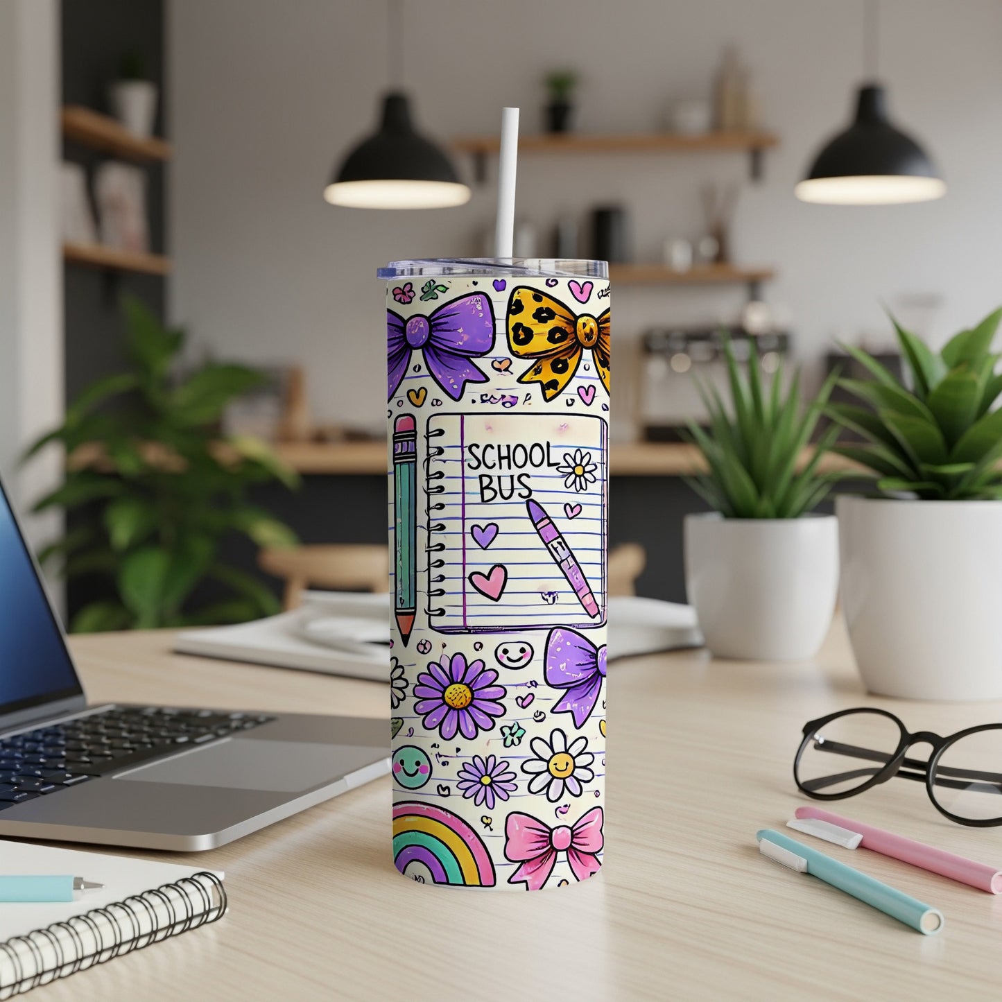 Tumbler with colorful school-themed doodles including bows, flowers, and a rainbow.