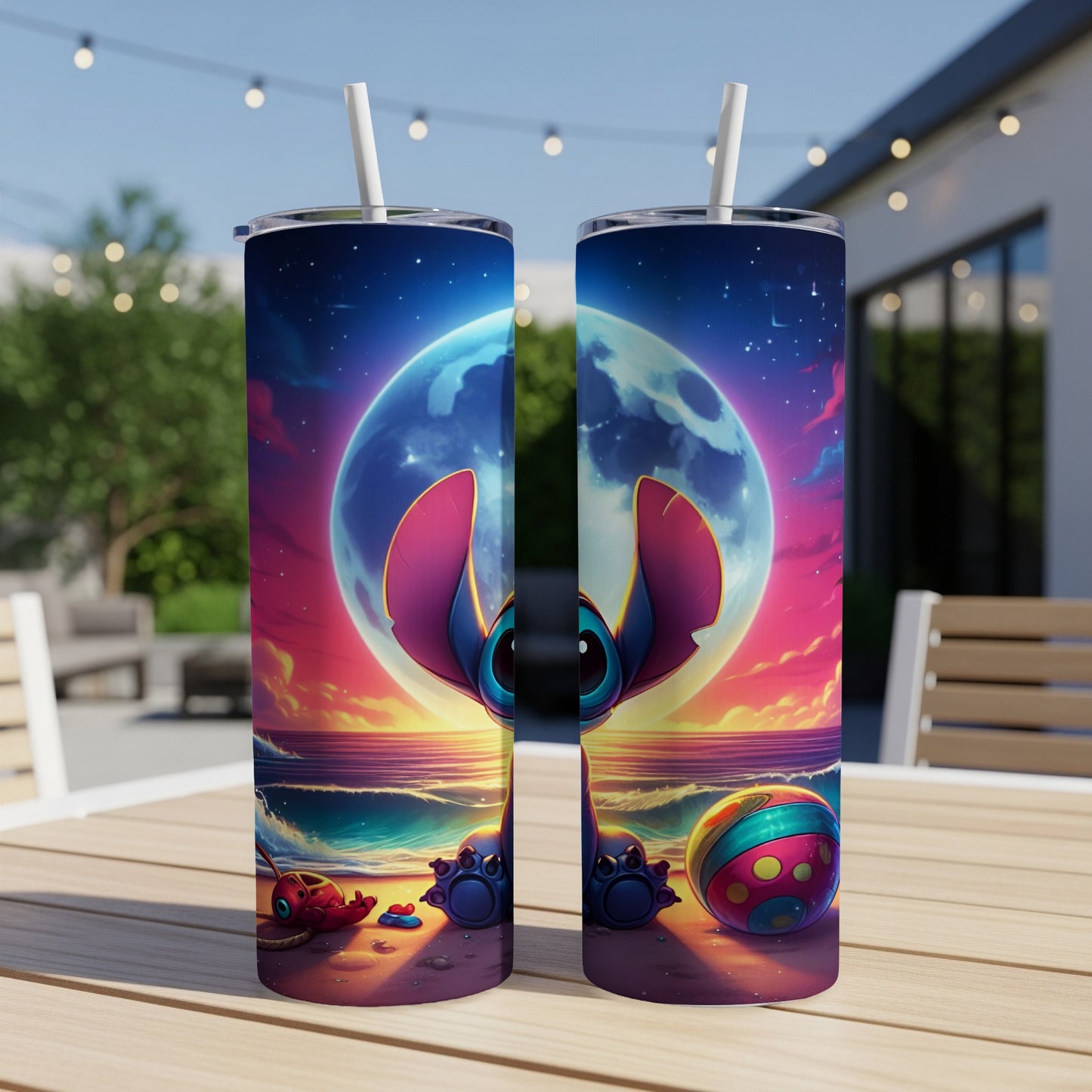 Two Stitch tumblers with a beach scene and large moon.