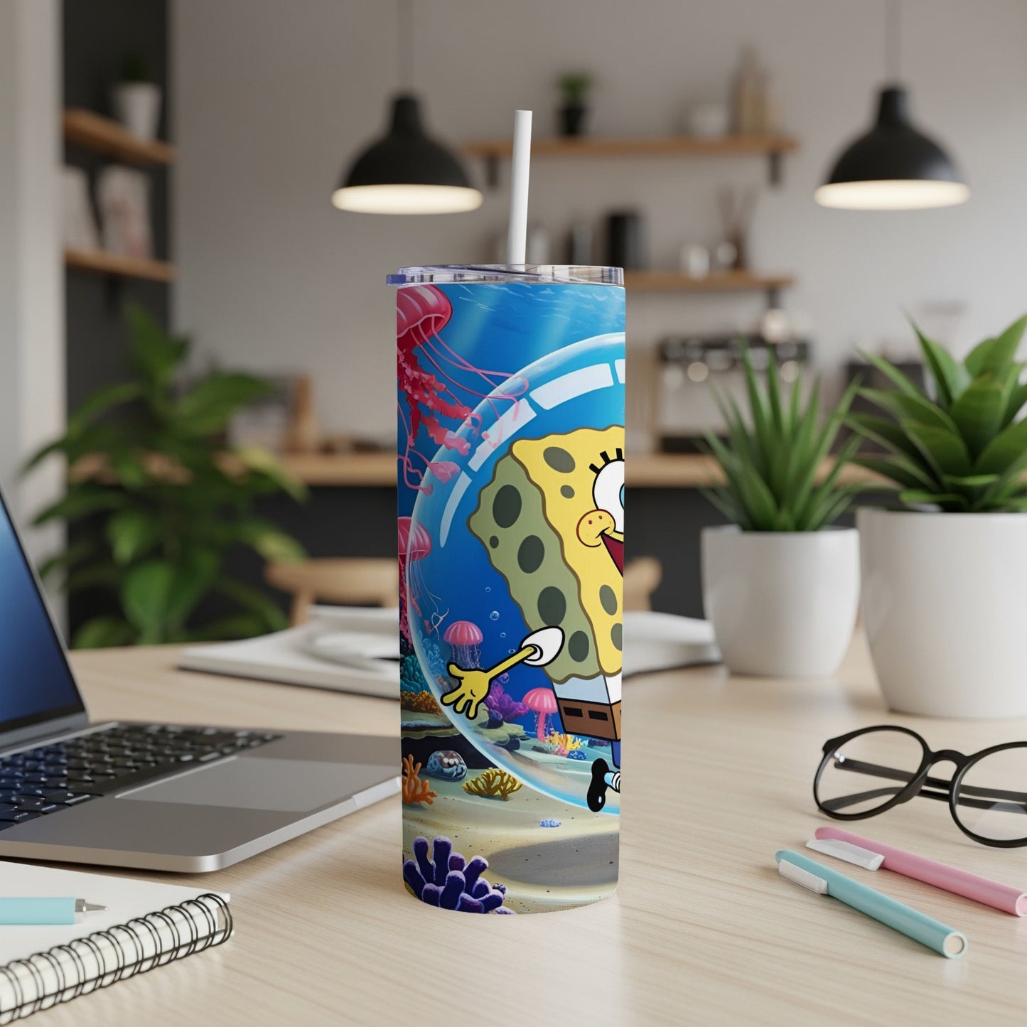 SpongeBob SquarePants themed tumbler with jellyfish and coral underwater scene.