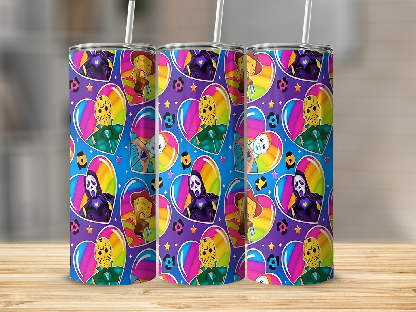 Tumblers with a pattern of horror movie villains in rainbow hearts on a purple background.