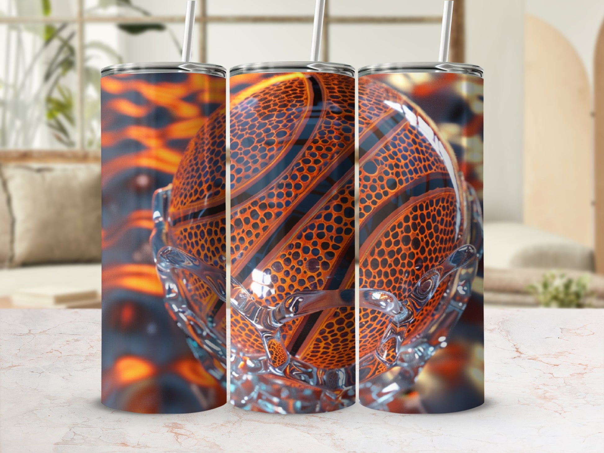 Basketball pattern on three tumblers with straws.
