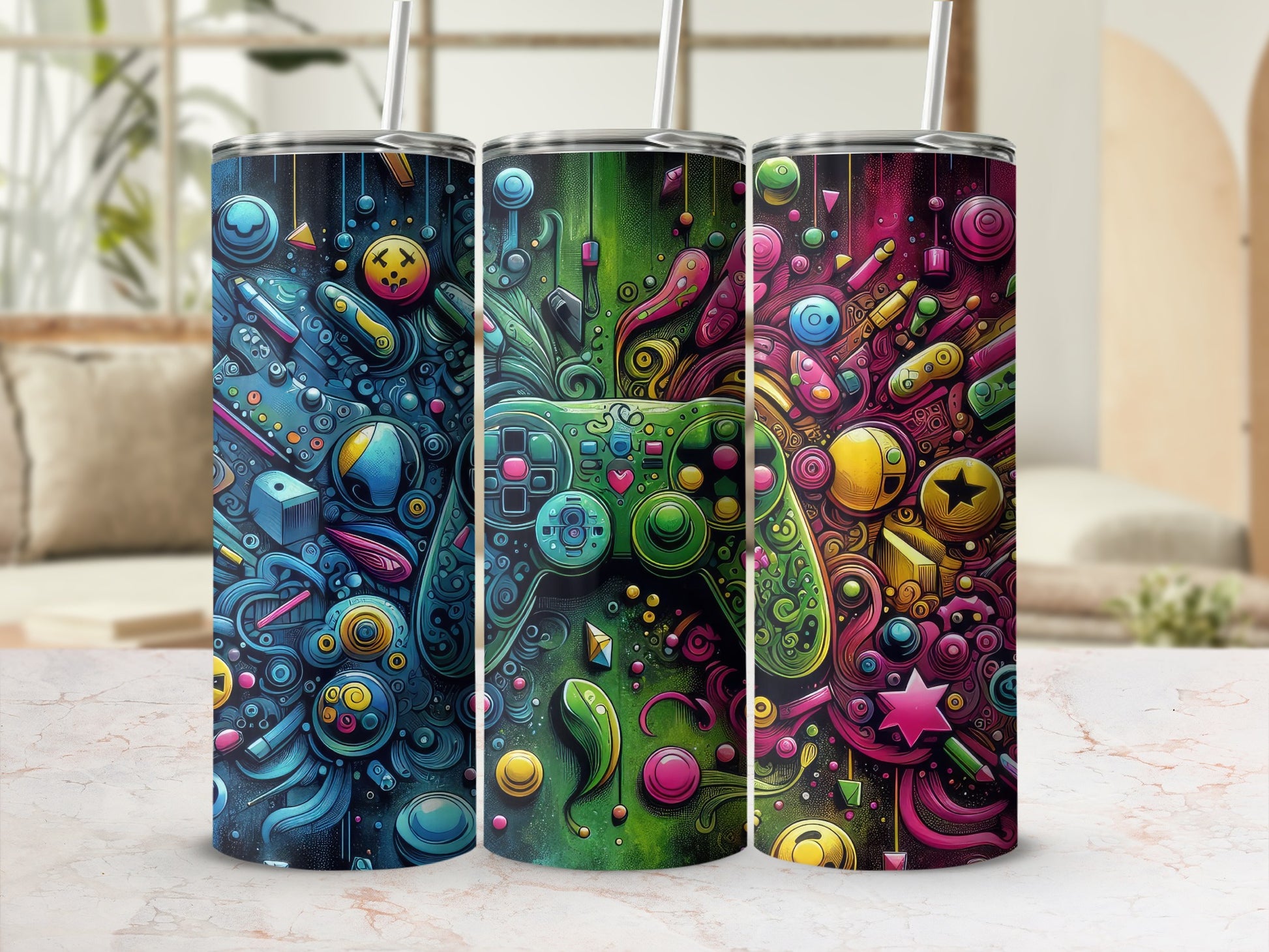 Three vibrant tumblers featuring abstract, colorful video game controller designs.
