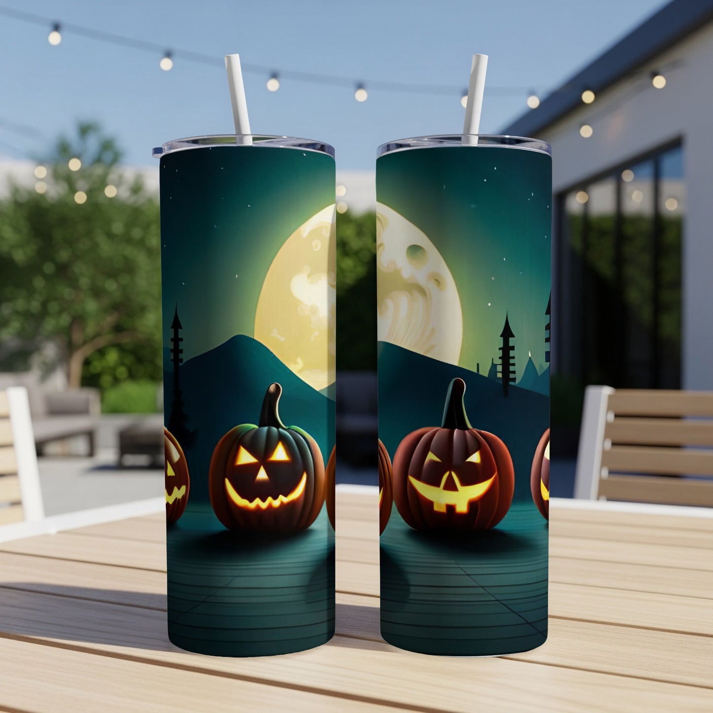Two tumblers with a Halloween jack-o'-lantern and moon design.