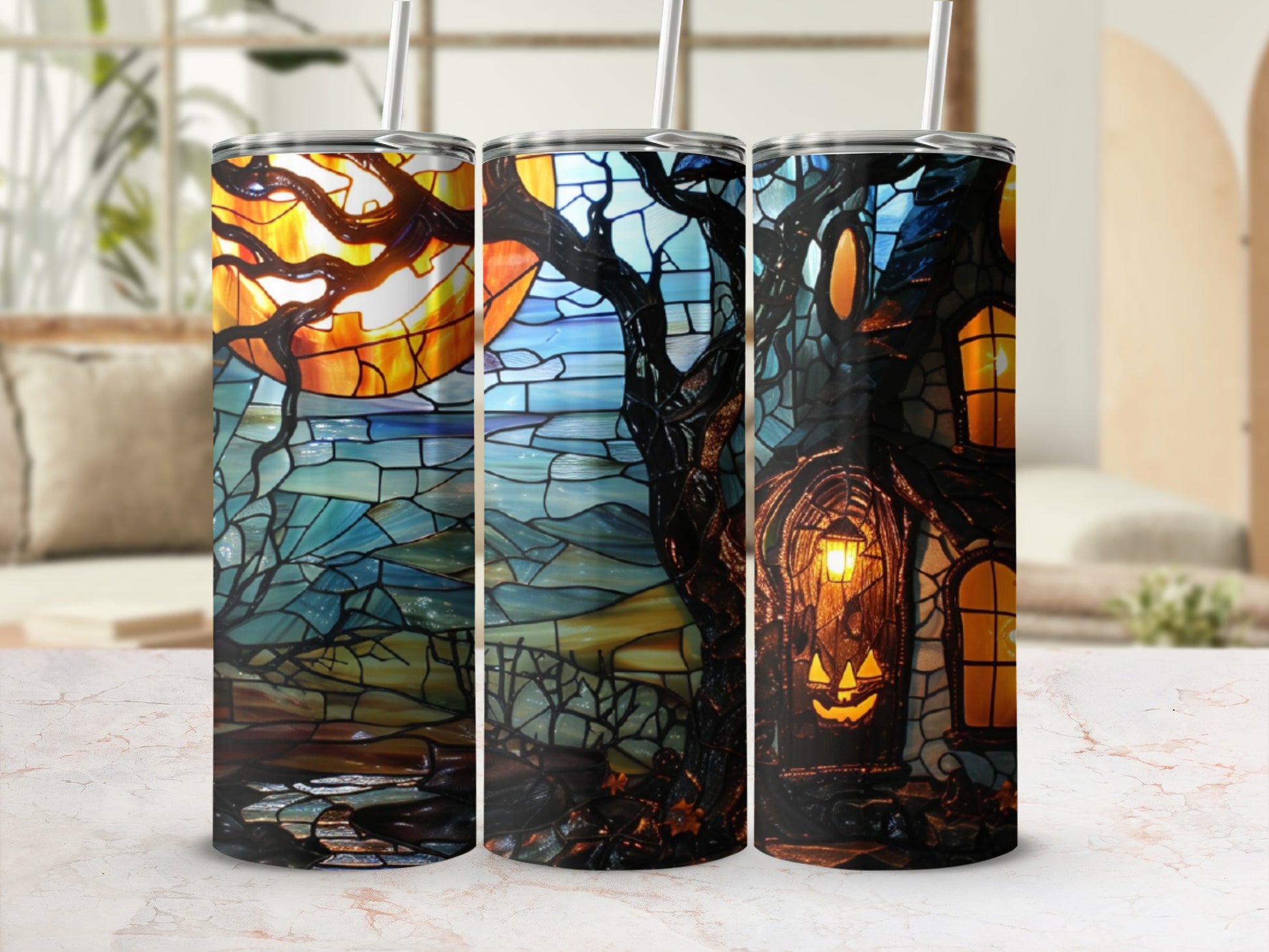 Halloween tumbler with stained glass-style art of a spooky tree and house.
