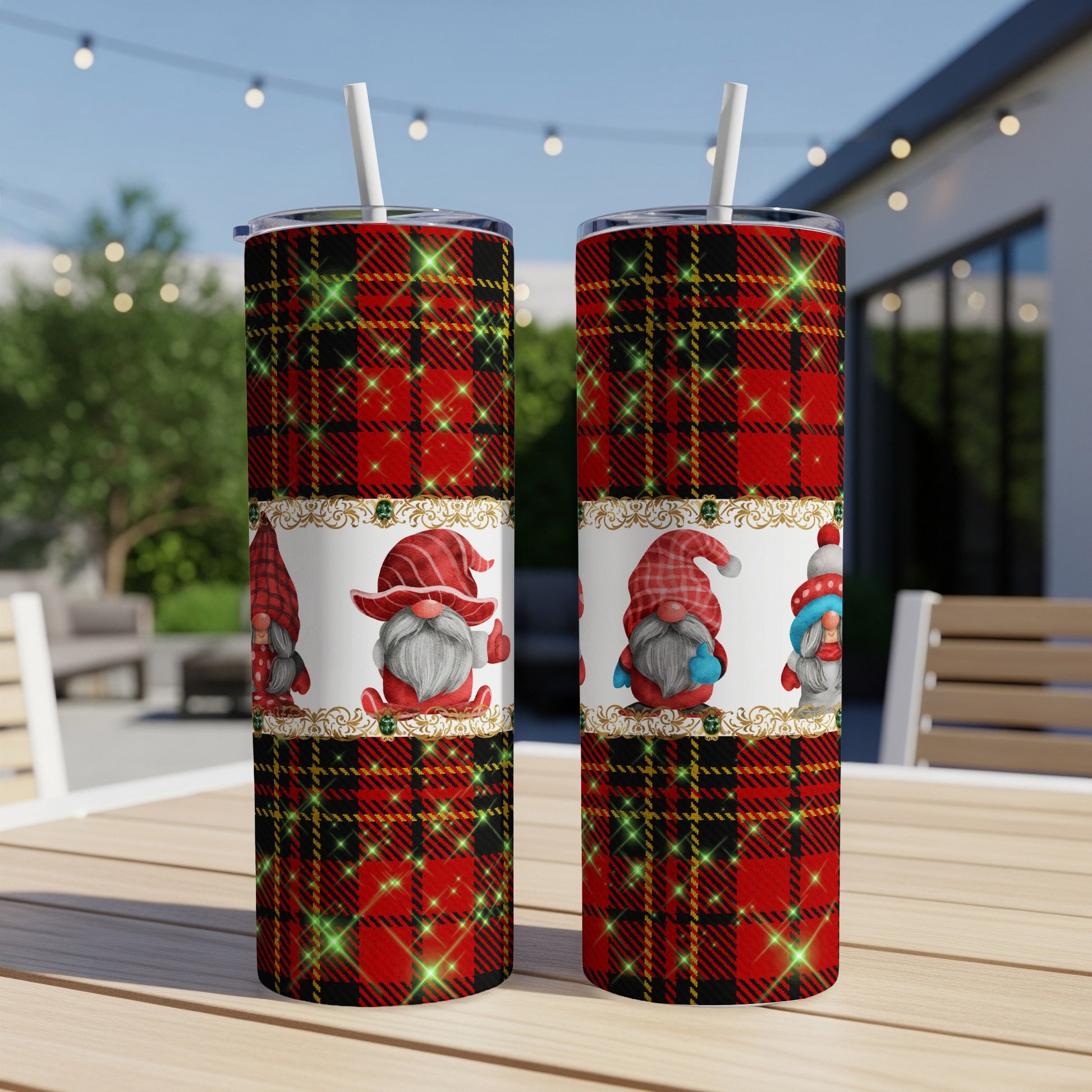 Two tumblers with plaid pattern and gnome characters on a table.
