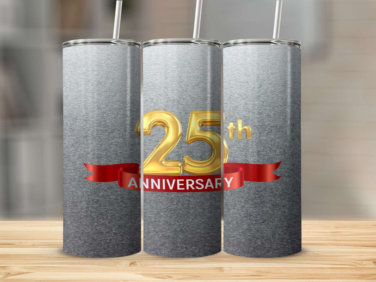 Three silver tumblers with "25th Anniversary" text on a red ribbon.