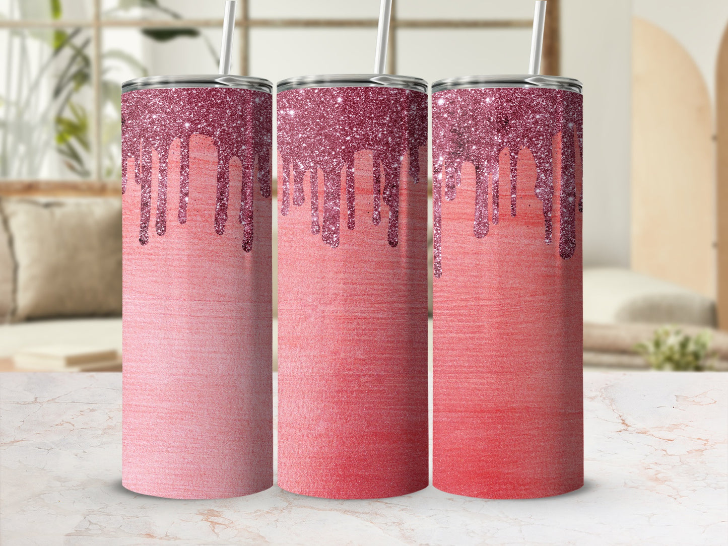 Three tumblers with dripping pink glitter and textured gradient designs.