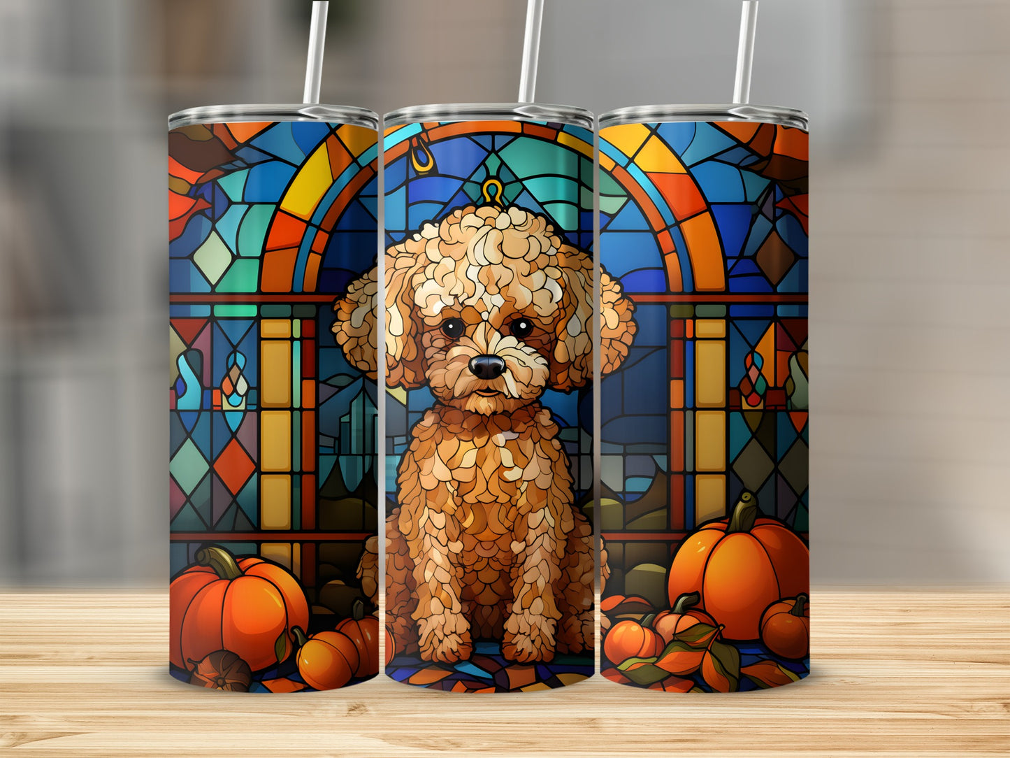 Three tumblers with a poodle and pumpkins against stained glass.