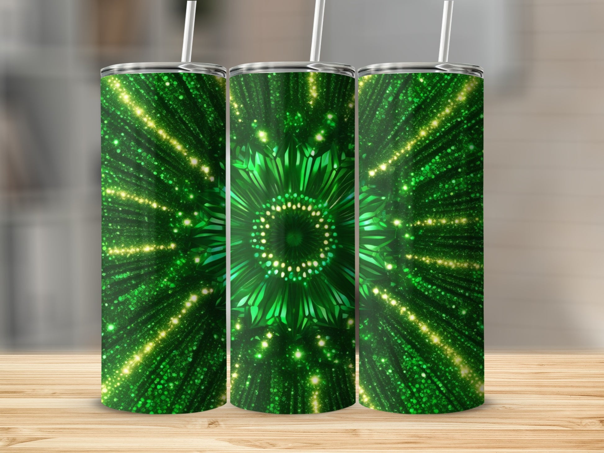 Three green tumblers with a sparkling, abstract green and yellow design.