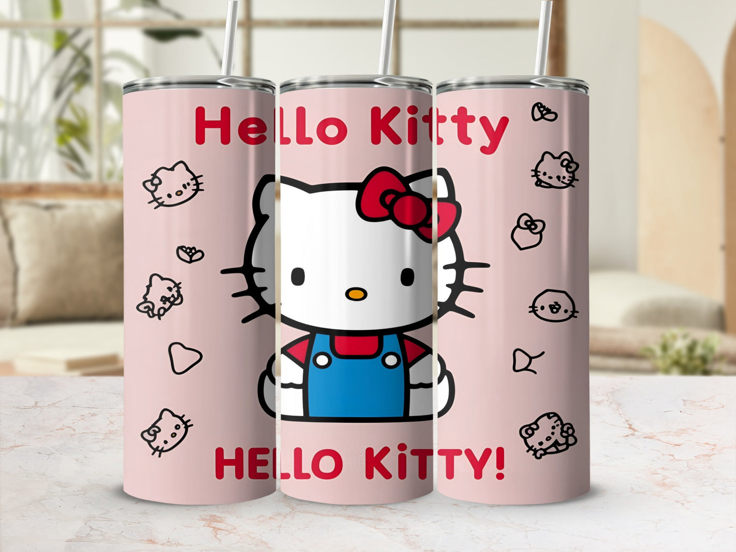 Pink tumbler with Hello Kitty graphic and "Hello Kitty!" text.