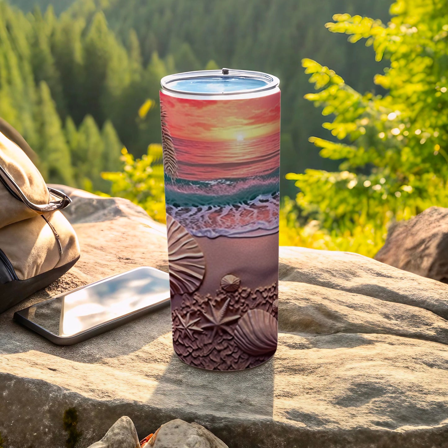 Beach scene tumbler with seashells and ocean waves on a rock.